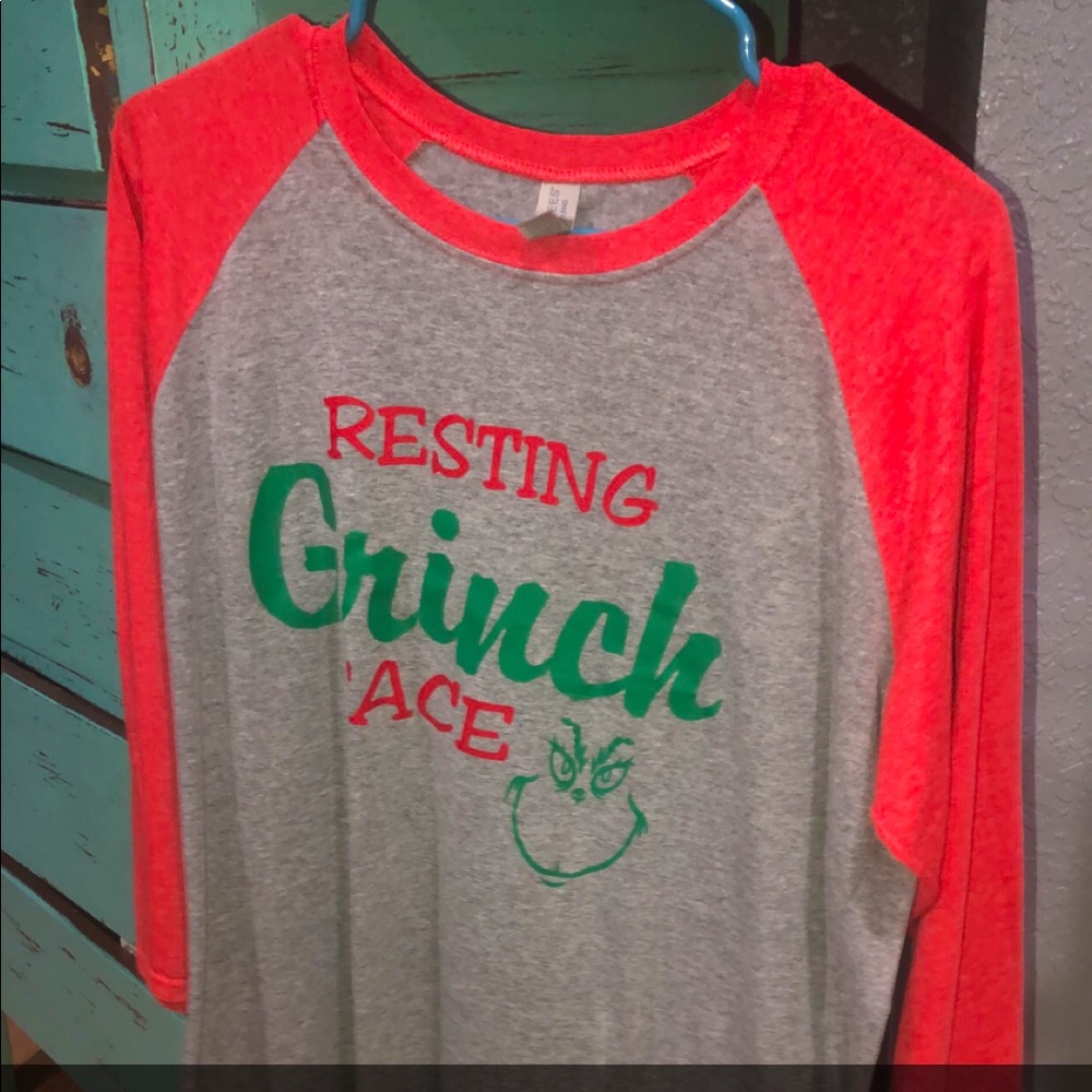 Women’s 3/4 sleeve Grinch Shirt.